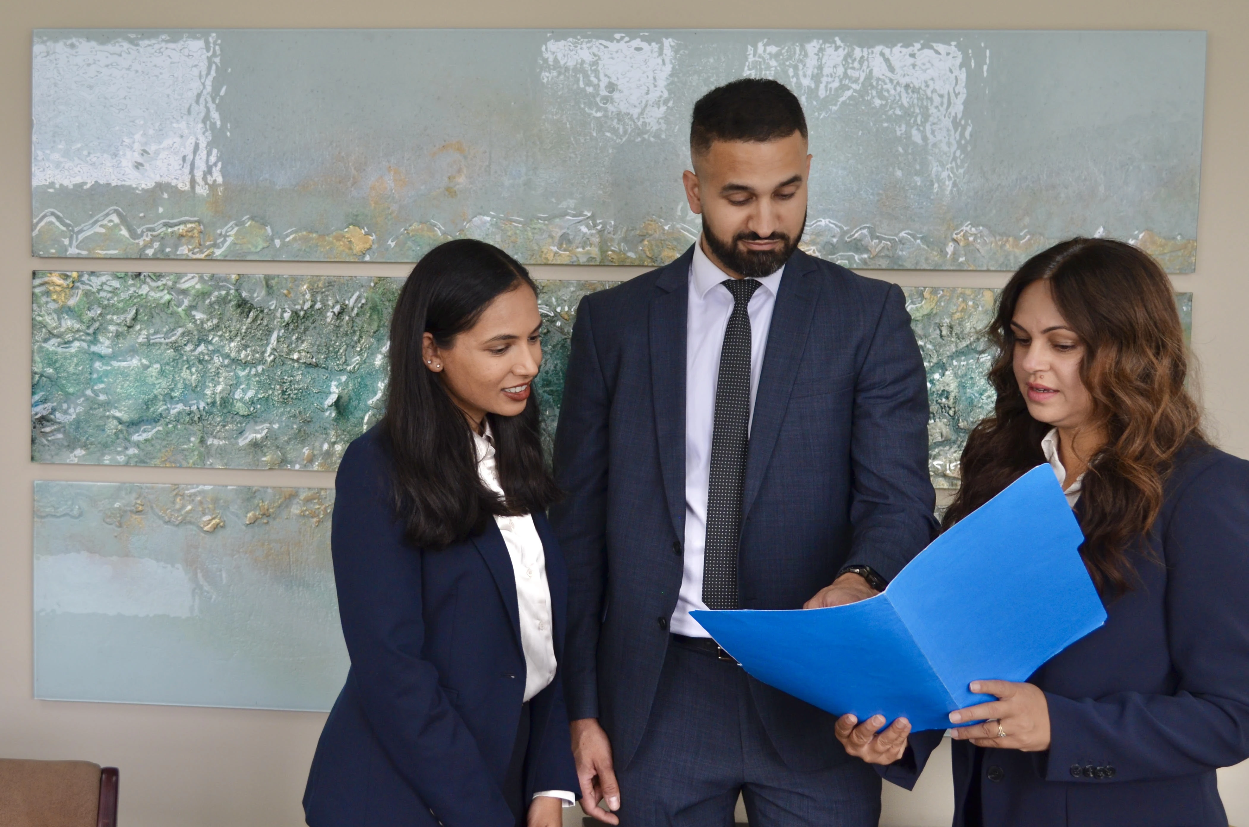 Fleetwood Family Law team reviewing documents in the office